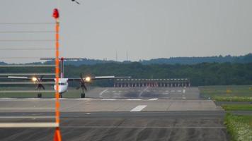 Turboprop decelerating speed after landing on runway at Dusseldorf internationl Airport, Germany video