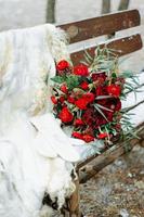 Winter wedding bouquet of red roses photo