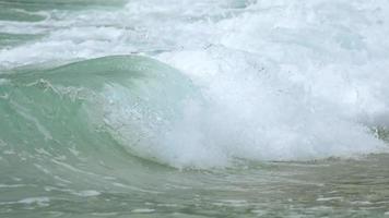 Turquoise waves rolled on the beach, Nai Harn Beach, Phuket video