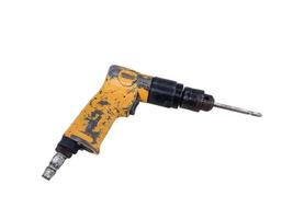 Old air screwdriver gun isolated on white background photo