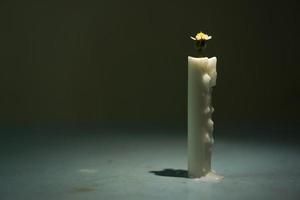 Creative concept of candle with a copy space. photo