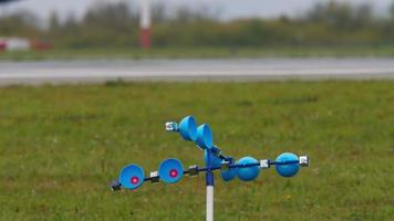 Bird repeller rotating in the wind on the premises of Kazan international airport video