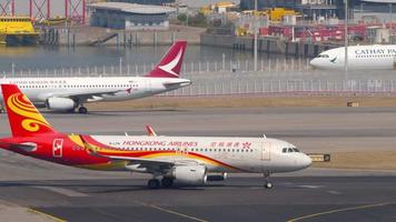 HONG KONG NOVEMBER 10, 2019 - Hongkong Airlines Airbus A320 B LPN lines up for departure from Chek Lap Kok International Airport, Hong Kong. Aircraft ready to fly video