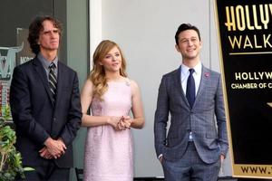 LOS ANGELES, OCT 3 - Jay Roach, Chloe Grace Moretz, Joseph Gordon-Levitt at the Hollywood Walk of Fame Ceremony for Julianne Moore at W Hollywood Hotel on October 3, 2013 in Los Angeles, CA photo