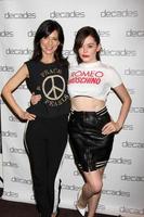 LOS ANGELES, MAR 20 - Perry Reeves, Rose McGowan at the Decades - Les Must De Moschino Event at Decades Boutique on March 20, 2014 in Los Angeles, CA photo