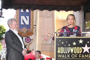 LOS ANGELES, NOV 05 - Ridley Scott, Kristen Wiig at the Ridley Scott Hollywood Walk of Fame Star Ceremony at the Hollywood Blvd on November 05, 2015 in Los Angeles, CA photo