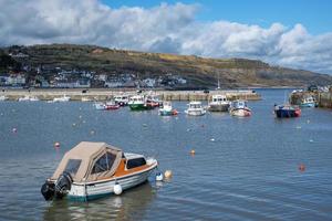 Lyme Regis, Dorset, UK, 2017. Boats in the Harbour at Lyme Regis photo