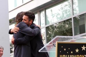 LOS ANGELES, MAY 9 - Rick Springfield, Jason Thompson at the Rick Springfield Hollywood Walk of Fame Star Ceremony at Hollywood Blvd on May 9, 2014 in Los Angeles, CA photo