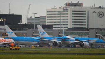 AMSTERDAM, THE NETHERLANDS JULY 27, 2017 - KLM Asia Boeing 777 PH BQH taxiing after landing. Shiphol Airport, Amsterdam, Holland video