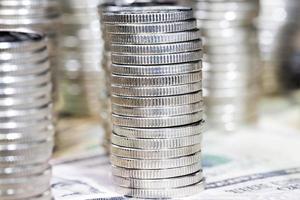 a large number of silver colored metal coins photo