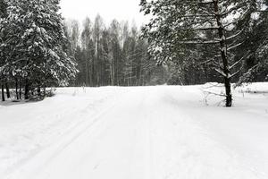 Snow covered road photo