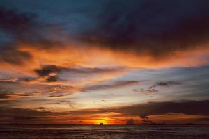Beautiful colorful sunset sky over the sea. photo