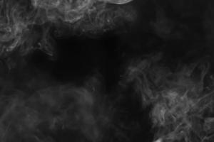 Abstract white smoke animated on a black background photo