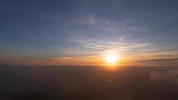 Bright orange sky and light of the sunrise at morning. photo