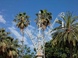 backlit details of a modernist chandelier in the city of Barcelona photo