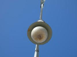 backlit details of a modernist chandelier in the city of Barcelona photo