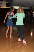 vLOS ANGELES, SEP 3 - Renee Bargh, Wendi McLendon-Covey at the The Goldbergs Press Event at Moonlight Rollerway on September 3, 2014 in Glendale, CA photo