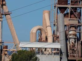 Cement factory with no activity in the vicinity of the city of Barcelona photo