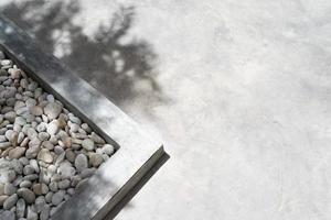 White pebble stone texture on the ground. The pebbles closely stone texture features photo