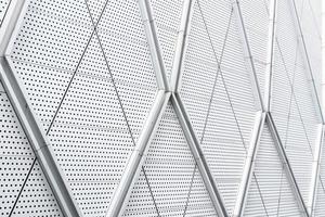 aluminium composite panels or cladding with perforated sheets on modern building facade, Abstract architecture background concept. photo
