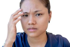 Young woman with upset expression looking at camera. Confused girl expressing distrust and suspicion, doubt and confusion. Woman with disgruntled face, worried and troubled uneasy, stare camera angry photo