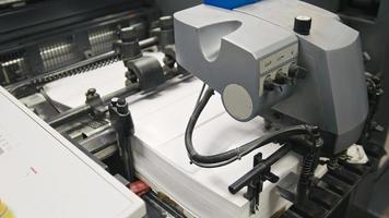 Machine working in printing house, polygraph industry - cleaning equipment, front view photo
