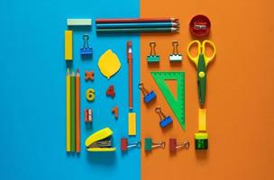 Back to school concept. School and office supplies on the office table. 2 color background.Flat lay with copy space.Autumn photo