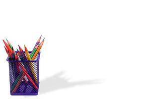 Image of colored pencils holder on white background. photo