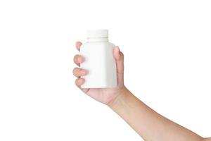 woman hand hold medicine bottle isolated on white background photo