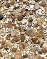 A surface with different rocks photo