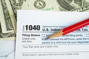 Tax form 1040 U.S. Individual Income Tax Return, business finance concept. photo