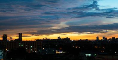 The colorful sky at sunset during twilight after the rain, gives a dramatic feeling, a bird-eye view of the city at twilight, a beautiful sky with clouds,Sky background with clouds,Nature abstract. photo