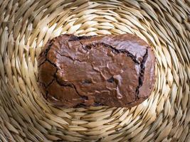 Delicious chocolate brownie homemade, ingredients of brownie,closeup fudge brownie,homemade bakery and dessert,Pieces of fresh brownie,confectionery concept. photo