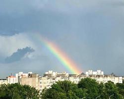 Rainbow over the city. High quality photo. photo