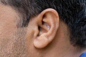 old senior man ear close-up macro shot photo