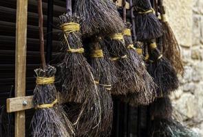 Handmade witches brooms photo