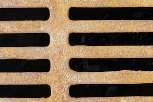Sewer grating, close up photo