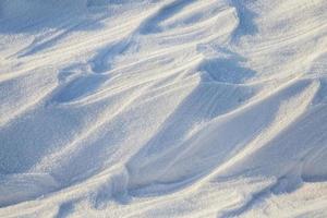 Snowdrifts, a field in winter photo