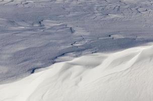 Snow drifts in winter photo