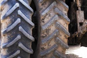 wheel tractor  . dirty wheels photo