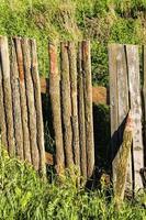 old primitive low fence, Eastern Europe photo