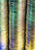 coins of silver color illuminated with yellow green color photo