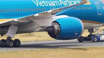 FRANKFURT AM MAIN, GERMANY JULY 17, 2017 - Vietnam Airlines Boeing 787 Dreamliner VN A863 towing by tractor from service. Fraport, Frankfurt, Germany video