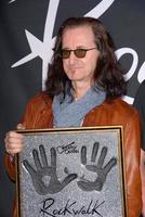 LOS ANGELES, NOV 20 - Geddy Lee of RUSH at the ceremony where RUSH is Inducted Into Guitar Center s RockWalk at Guitar Center on November 20, 2012 in Los Angeles, CA photo