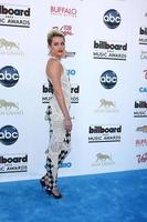 los angeles, 19 de mayo - miley cyrus llega a los billboard music awards 2013 en el mgm grand garden arena el 19 de mayo de 2013 en las vegas, nv foto