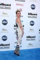 LOS ANGELES, MAY 19 - Miley Cyrus arrives at the Billboard Music Awards 2013 at the MGM Grand Garden Arena on May 19, 2013 in Las Vegas, NV photo