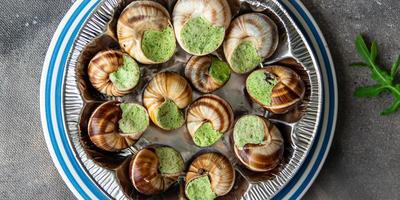 snails green garlic oil fresh healthy meal food snack on the table copy space food background rustic top view photo