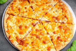 cheesy pizza 4 types of cheese fresh dish healthy meal food snack diet on the table copy space food background rustic top view photo