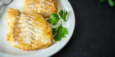 fried fish fresh seafood cod fish second course meal food snack on the table copy space food background photo