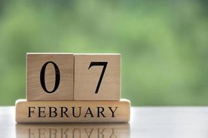 February 7 calendar date text on wooden blocks with customizable space for text or ideas. Copy space photo